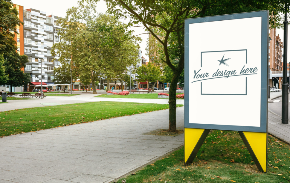 Customizable advertising poster in a park in the city